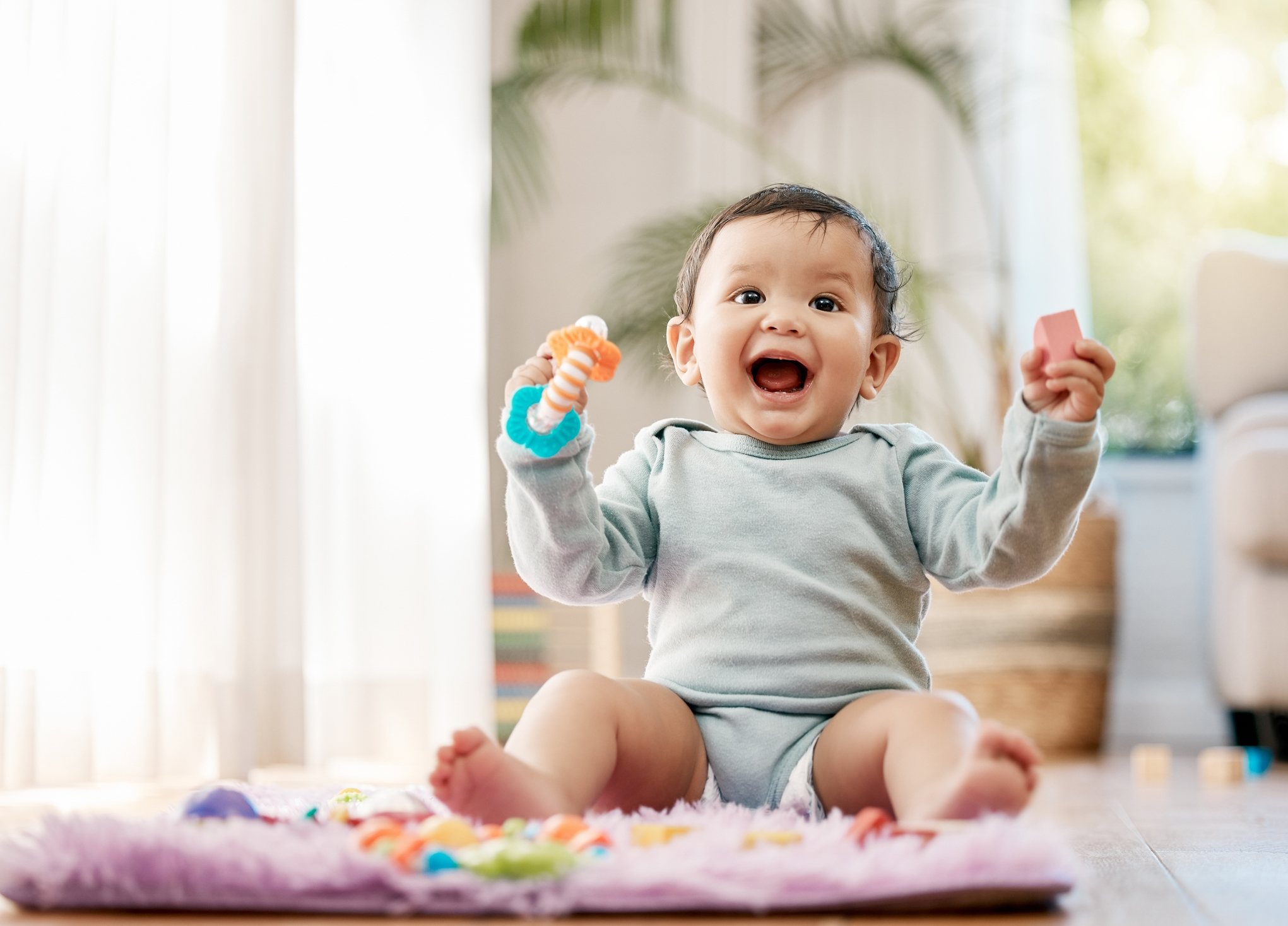 Shot of an adorable baby playing